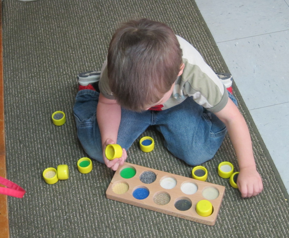 Child playing with a puzzle