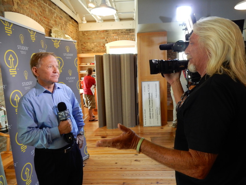Quint Studer giving an interview to a reporter