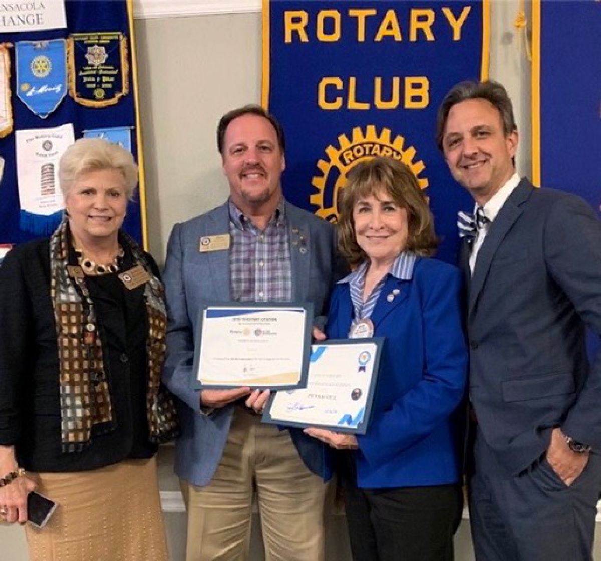 Rotary Club members receiving an award