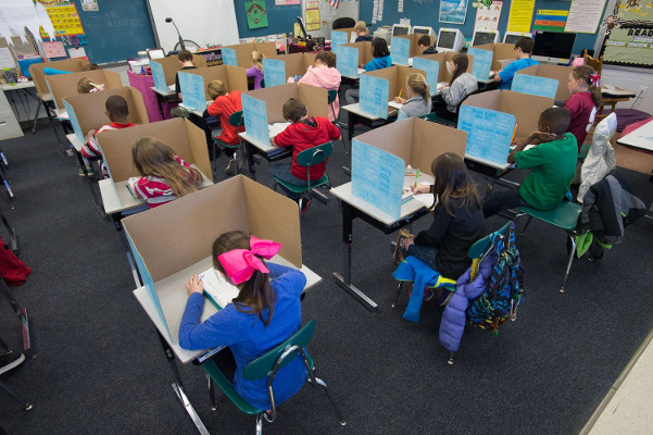 Children testing in classroom